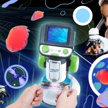child playing with plastic microscope with screen