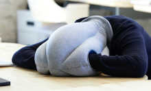 Person wearing Ostrich Pillow